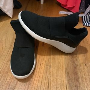 Black slip on Donna Karan sneakers size 7